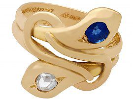 gold snake ring with sapphire and diamond