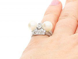 Pearl and Diamond Dress Ring on finger