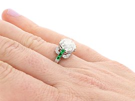 Wearing Diamond Solitaire with Emerald Side Stones