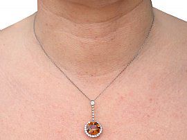 wearing a zircon pendant