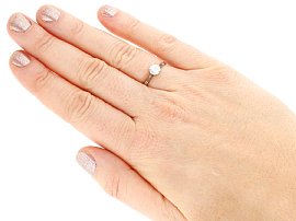 Wearing platinum round cut engagement ring