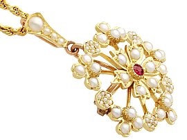 Yellow gold pearl and ruby brooch 