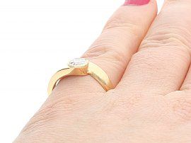 Solitaire Twist Engagement Ring Gold being worn