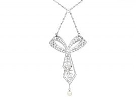 1.29ct Diamond and Pearl, Platinum Bow Pendant - Antique Circa 1900