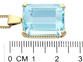 Gold Emerald Cut Aquamarine Pendant