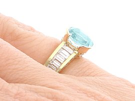 Aquamarine Ring with Baguette Diamonds on Hand