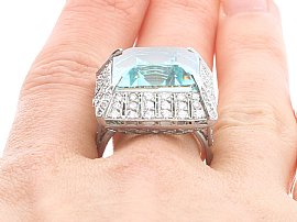 Emerald Cut Aquamarine Platinum Ring on Finger