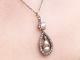 Diamond and Pearl Pendant on Neck