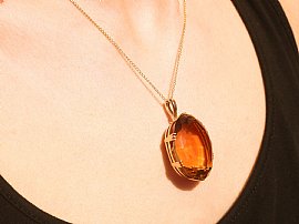 Citrine and Yellow Gold Pendant Wearing Close Up