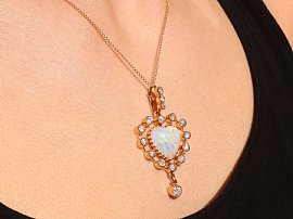 Wearing an Antique Opal Heart Pendant 