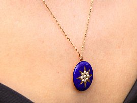 Antique Yellow Gold Enamel and Pearl Locket Wearing Close Up
