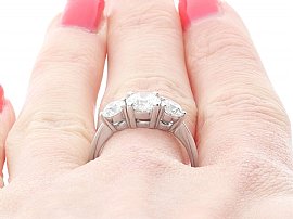 Round Brilliant Cut Diamond Trilogy Ring on finger