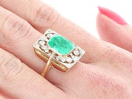 Emerald and Diamond Ring Wearing Side On 