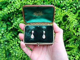 Pear cut diamond earrings outside