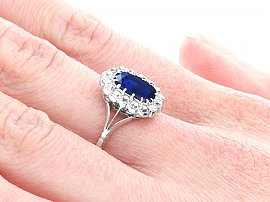 Blue Sapphire and Diamond Ring Wearing Side On 