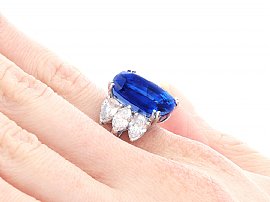16 Carat Sapphire Ring with Diamonds on finger