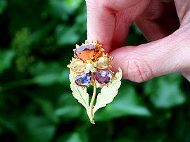 Gemstone and Gold Pansy Brooch Outside 