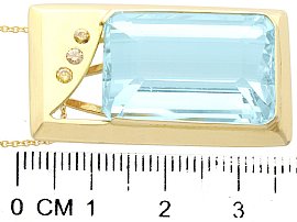 Size of Aquamarine and Diamond Pendant in 14k Yellow Gold