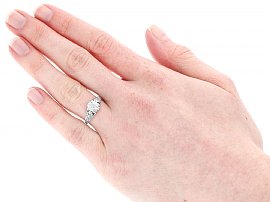 Solitaire Engagement Ring with Diamond Shoulders Wearing Image