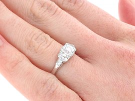 Solitaire Diamond Ring with Shoulders on the Hand