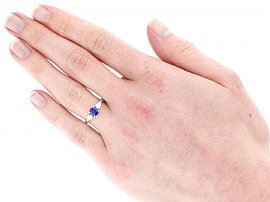 Platinum Sapphire Diamond Trilogy Ring Wearing Image