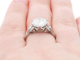 Close up Wearing Image of Diamond Solitaire Ring with Diamond Shoulder Accents