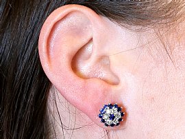 Sapphire and Diamond Earrings Being Worn