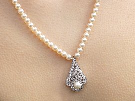Pearl Strand Necklace with Pendant Wearing 