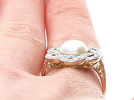Diamond and Pearl Ring Being Worn