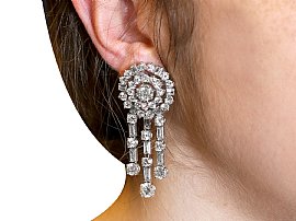 Wearing White Gold Diamond Drop Earrings UK 
