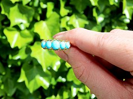 turquoise stone gold ring outside