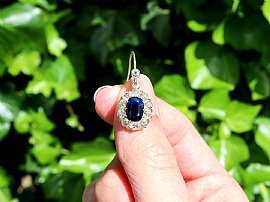 Blue Sapphire Dangle Earrings in Gold Ouside