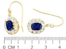 Size of  Blue Sapphire Dangle Earrings in Gold