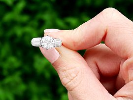 Solitaire Diamond Ring with Baguettes  Outside