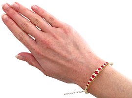 Wearing Image for Antique Ruby and Diamond Gold Bangle