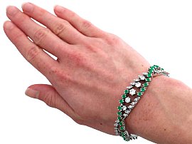 Diamond and Emerald Bracelet Being Worn