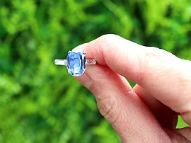 Cushion Cut Sapphire Ring with Baguette Side Stones Outside