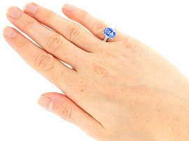 Wearing Cushion Cut Sapphire Ring with Baguette Side Stones
