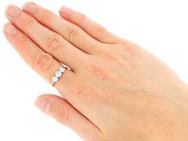 Wearing Round Cut Three Stone Engagement Ring
