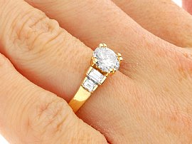 Round and Baguette Diamond Engagement Ring