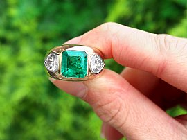 Emerald and Diamond Dress Ring in Yellow Gold In natural light