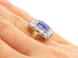 Rectangular Cut Sapphire Ring with Diamonds On the Hand