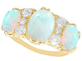 Three stone Opal and Diamond Ring in Yellow Gold