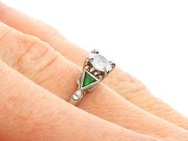 Diamond and Emerald Ring Being Worn