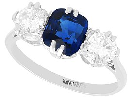 1920s 1.33ct Basaltic Sapphire and 0.88ct Diamond Trilogy Ring in Platinum