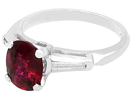 Vintage Oval Ruby Ring with Baguette Side Stones