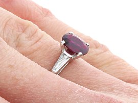Oval Ruby Ring with Baguette Side Stones Wearing