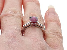 Wearing Oval Ruby Ring with Baguette Side Stones