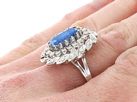 Wearing Oval Sapphire Ring with Diamonds