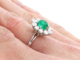 Wearing Cabochon Emerald and Diamond Ring